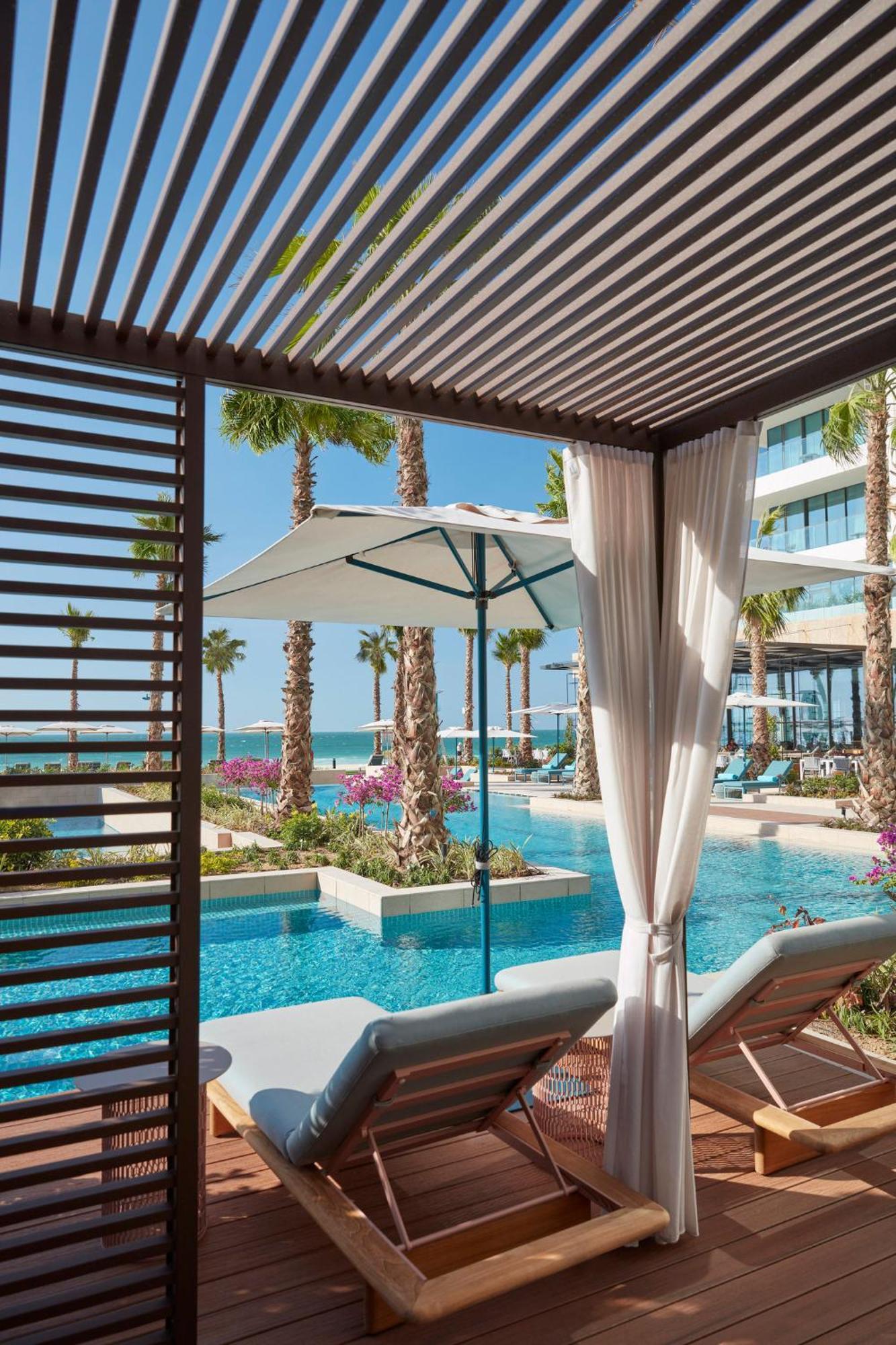 Mandarin Oriental Jumeira, Dubái Exterior foto The swimming pool at the resort